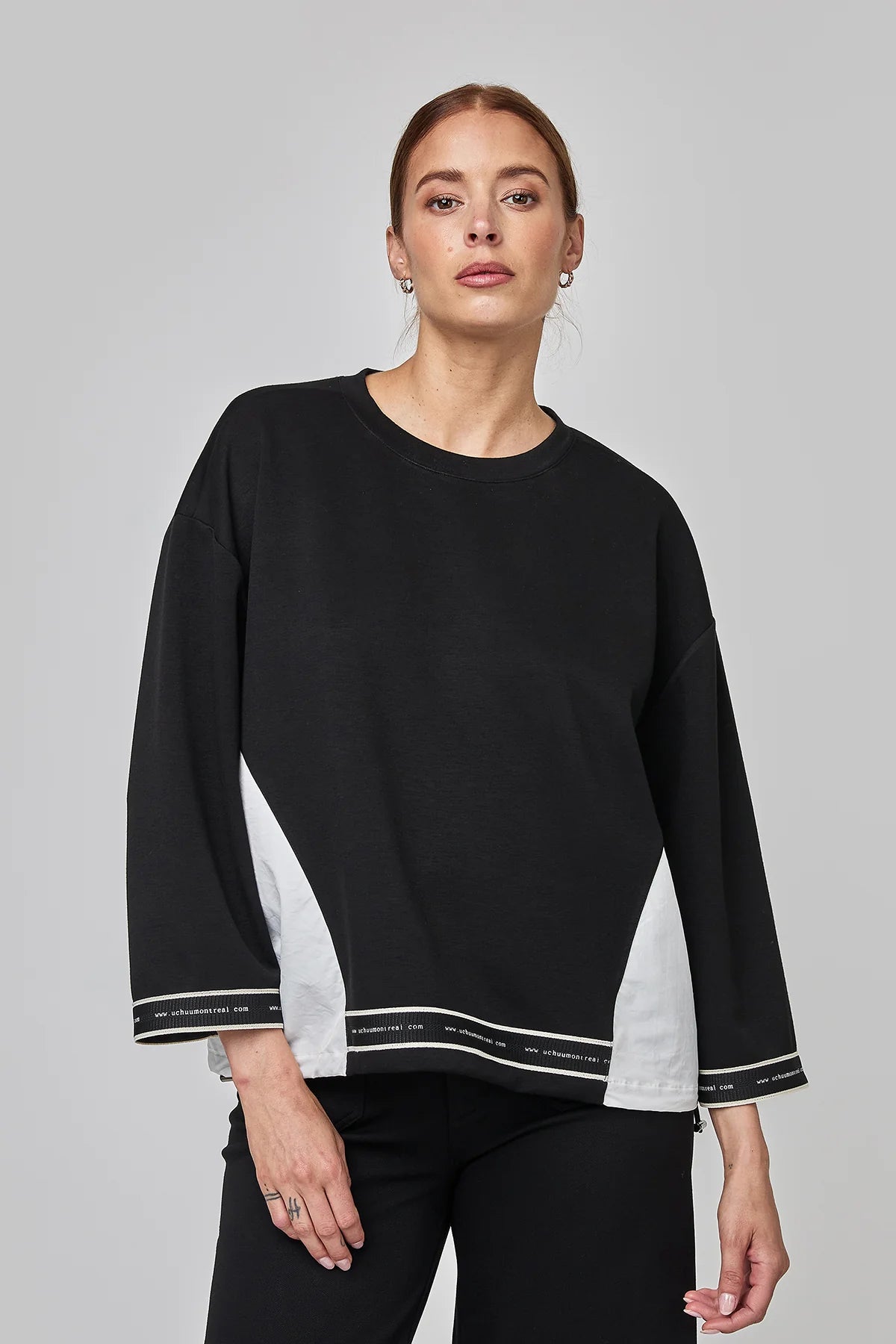 Woman wearing a black and white top