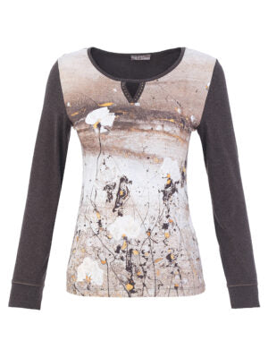 A women's long-sleeve top with dark charcoal gray sleeves and a beige, brown, and white abstract floral print on the body, featuring a small keyhole cutout at the neckline.
