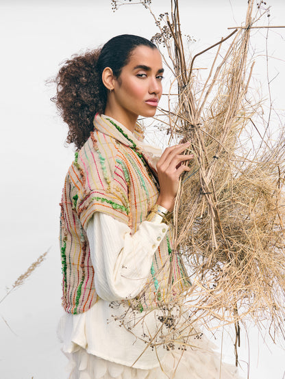 Women’s multicolour textured woven gilet jacket with collar and button front, sleeveless European style layering piece.