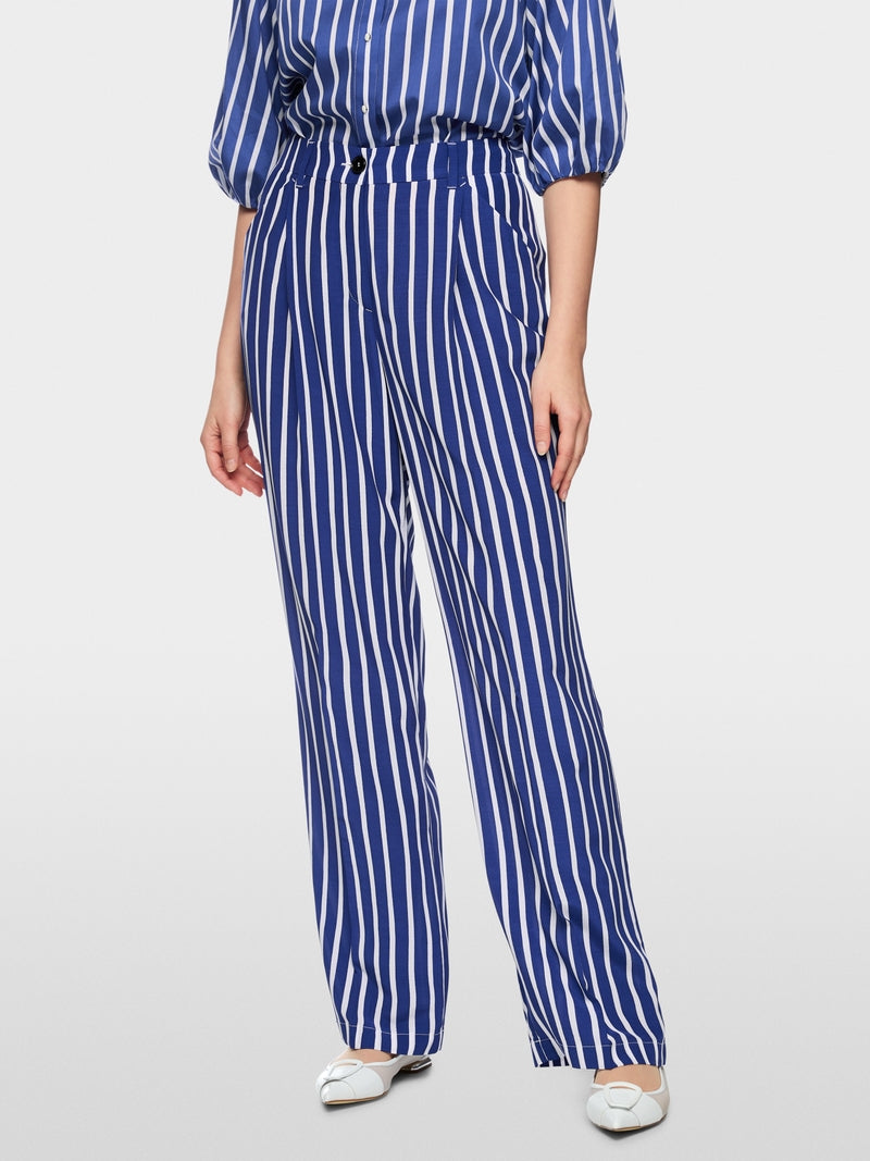 Blue and white striped outfit on a plain background