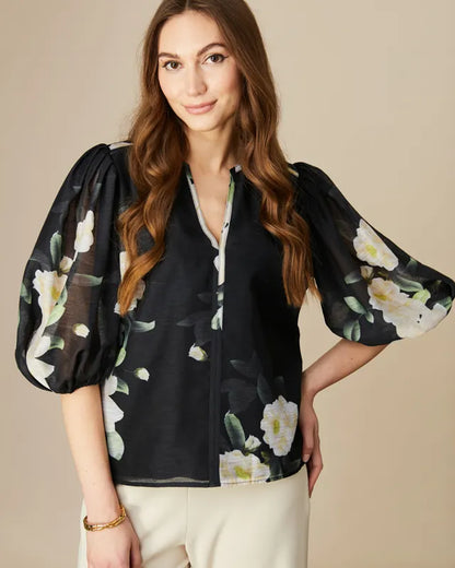 puff sleeve and a flattering V-neckline blouse