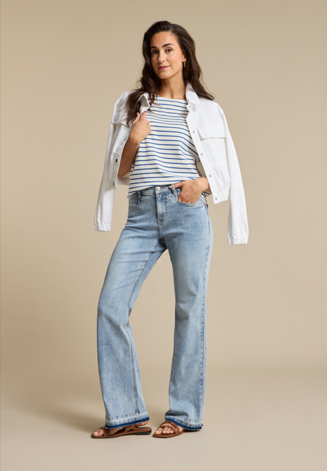 White cropped denim jacket with button front, chest pockets, and elasticated hem and cuffs.