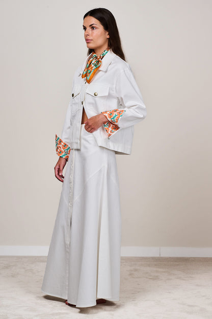 White statement jacket with large colourful embroidered back panel, women’s designer jacket, rear view.